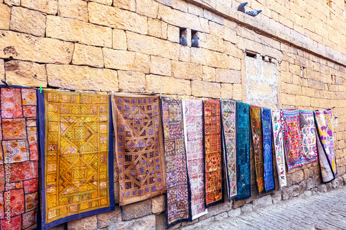 Decoration of Fabric handmade shop hang on the wall for sale at Jaisalmer Fort, Rajasthan India.