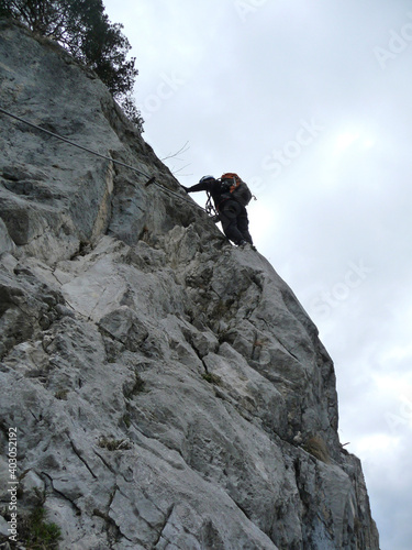 Climber at Drachenwand via ferrata, Salzburg, Austria