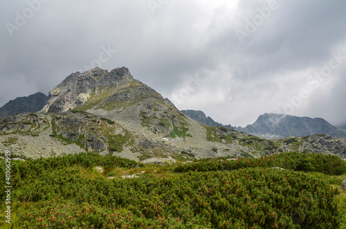 High rocky peaks national park of the High Tatra mountains with mountain Valley and sky with clouds. Slovakia 
