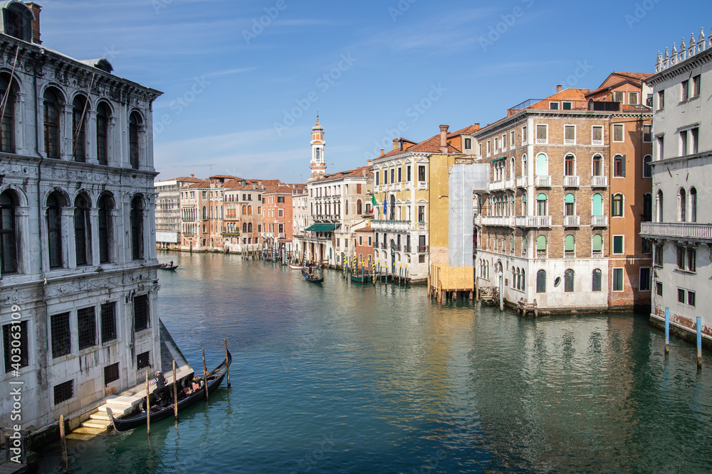 A small harbor for mooring and gondola is popular for sightseeing boat rides in the Venice city.