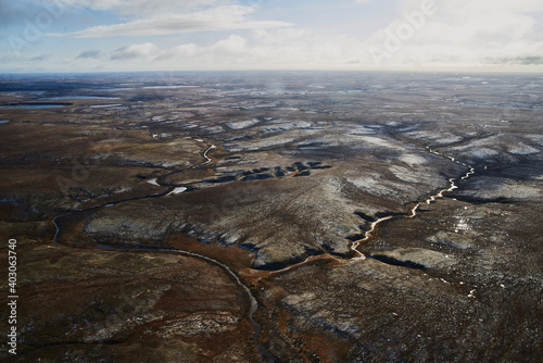 Summer nature landscape from above. Mountain range aerial view. river bank in the morning in the tundra. Taimyr Peninsula, Russia. Norilsk photo