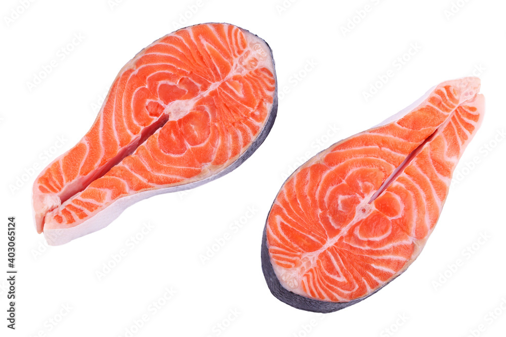 Raw fish salmon steak prepared for cooking, top view on white isolated background