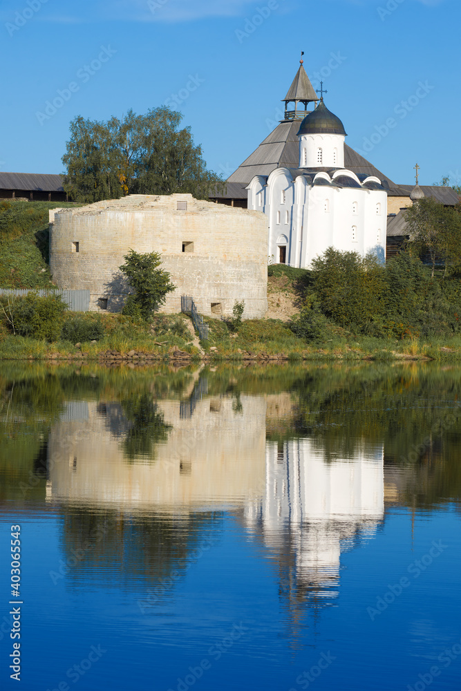Medieval church of St. George in the Old Ladoga fortress on a sunny summer morning. Leningrad region, Russia Medieval church of St. George in the Old Ladoga fortress on a sunny summer morning. Leningrad region, Russia