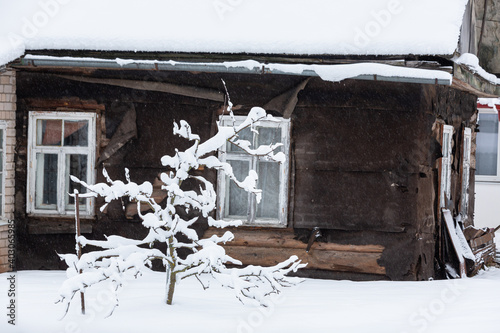 Fototapeta Naklejka Na Ścianę i Meble -  snowy winter on the streets of a small town in january 2021