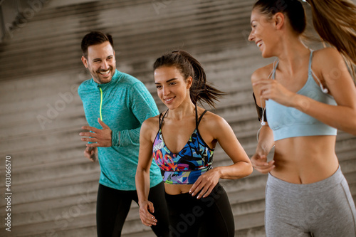 Young people running in the...