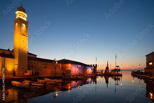 Scenic sunset at Lazise sul Garda, Garda lake, Italy. Garda lake is a popular touristic destination in northern Italy and offers some scenic sunset throughout the year