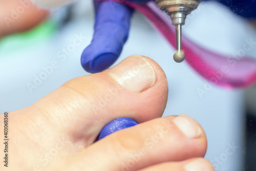 Hardware pedicure  removal of old skin from toes