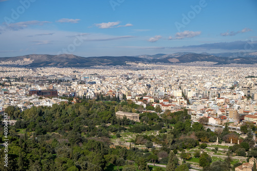 Athens - December 2019: view of the city from the Acropolis with Temple of Hephaestus © Matteo