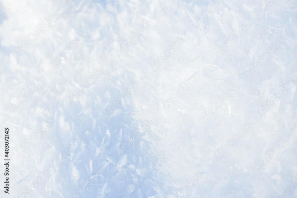 Hoarfrost background texture. Fresh ice and snow winter backdrop with snowflakes and mounds. Seasonal wallpaper. Frozen water geometrical shapes and figures. Cold weather atmospheric precipitation. Hoarfrost background texture. Fresh ice and snow winter backdrop with snowflakes and mounds. Seasonal wallpaper. Frozen water geometrical shapes and figures. Cold weather atmospheric precipitation.