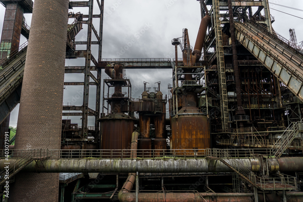 Blast Furnace in Dortmund, Germany. The coal mining and steel in the region collapsed and nowadays this colossal buildings are abandoned and unused.