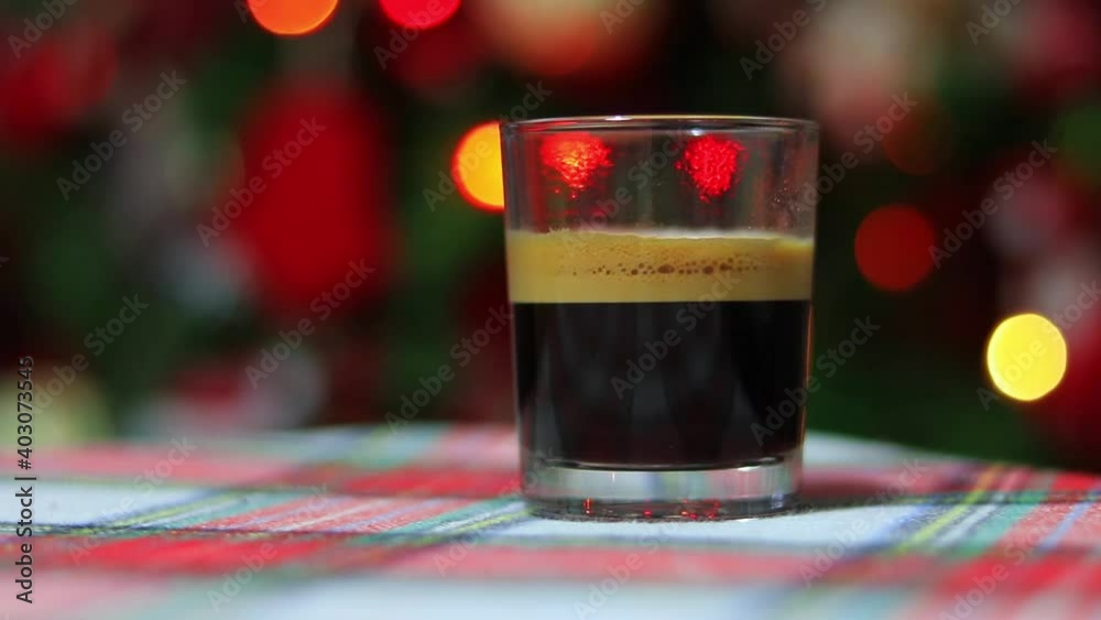 Cup of italian espresso coffee with Bokeh lights in background Cup of italian espresso coffee with Bokeh lights in background