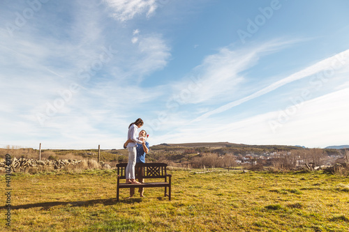 Young couple  Hugging  kissing and enjoying spending time together while celebrating Saint Valentine s Day in the countryside. Love san valentin and Relationship concept.