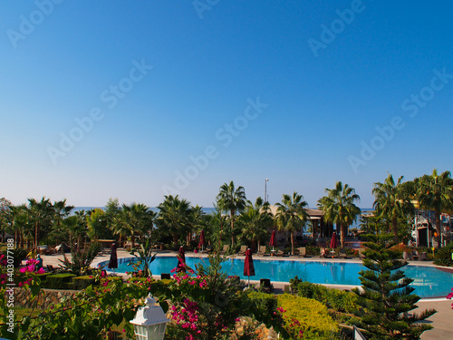 View from the top on the swimming pool  sea  trees and landscape. Turkey  Alanya.