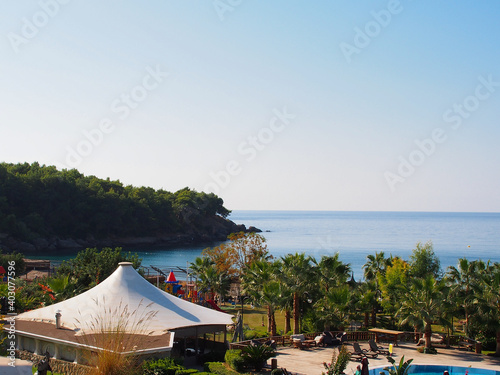 View from the top on the swimming pool, sea, trees and landscape. Turkey, Alanya.