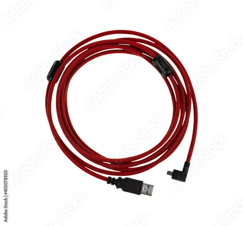 Red tethering USB2.0 to mini 8 Pin shooting cable for data transmission between DSLR cameras and computer isolated on white background. With removable magnetic ring