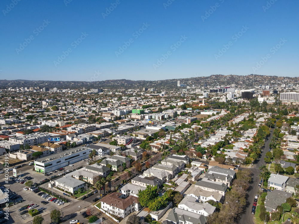 Fototapeta premium Aerial view above Mid-City neighborhood in Central Los Angeles, California. USA