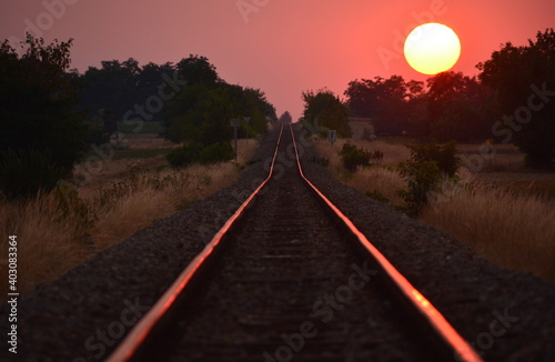 sunset over the railroad photo