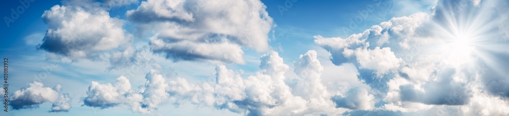white fluffy clouds on blue sky in summer white fluffy clouds on blue sky in summer