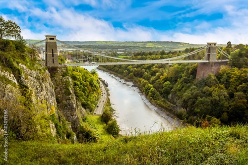 A view looking up the Avon gorge towards Bristol and the Clifton Suspension bridge that spans it on a bright Autumn day