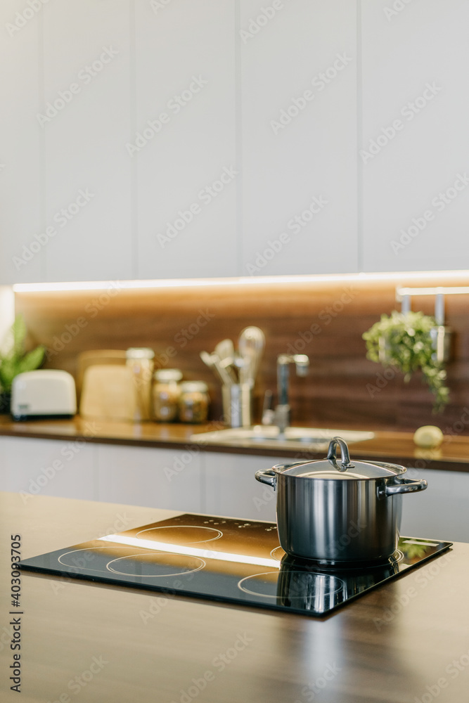 Objects on kitchen table in contemporary apartment Objects on kitchen table in contemporary apartment