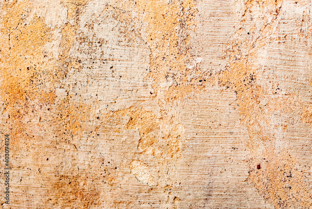 Texture of a concrete wall with cracks and scratches which can be used as a background Texture of a concrete wall with cracks and scratches which can be used as a background