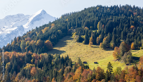 Mountain landscape near Garmisch-Partenkirchen. Snow covered Alpspitze mountain peak in the background.