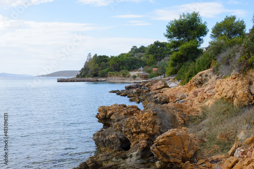 Beautiful sharp stones by the sea. Deserted rocky beach in the resort of Bodrum, Turkey.