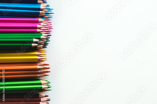 Variety of color pencils isolated on white background