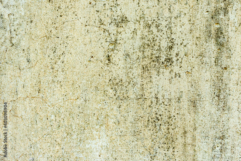 Texture of a concrete wall with cracks and scratches which can be used as a background