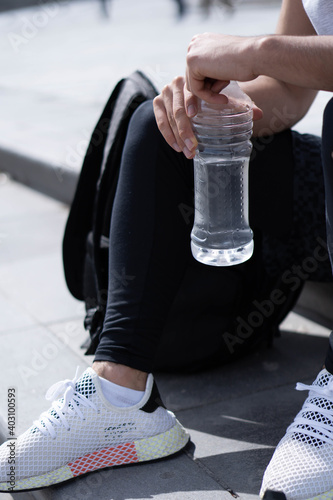 Young man listening to music for exercise.