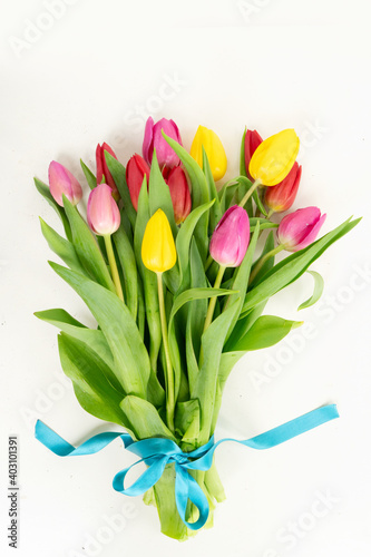 Pink, yeelow and violet tulips flowers