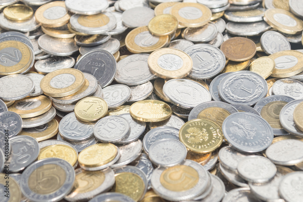 PLN, polish zloty coins as background. PLN, polish zloty coins as background.