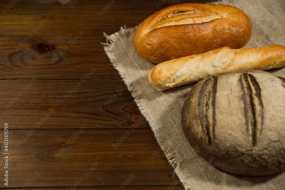 homemade bread on wooden rustic background homemade bread on wooden rustic background