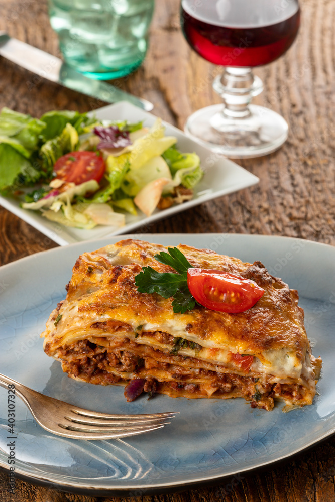 portion of lasagna on a plate portion of lasagna on a plate