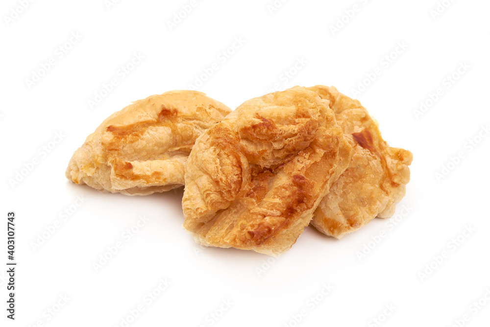 Fresh puff pastries, isolated on white background Fresh puff pastries, isolated on white background