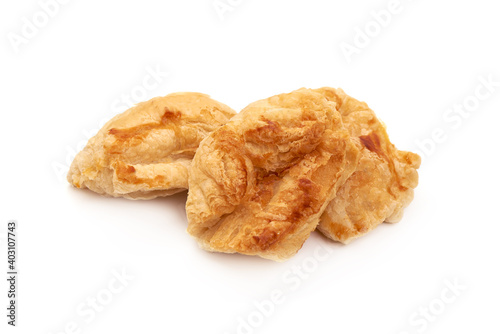 Fresh puff pastries, isolated on white background