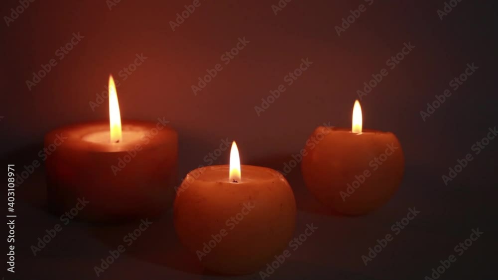 Tree burning candles in the dark Tree burning candles in the dark