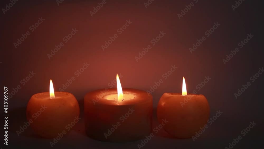 Tree burning candles in the dark Tree burning candles in the dark