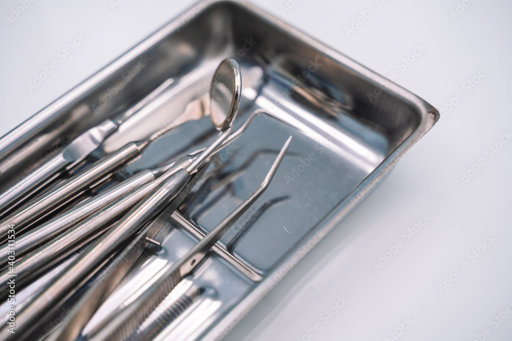 Dental silver tray with instruments, sterile condition of items, therapy kit