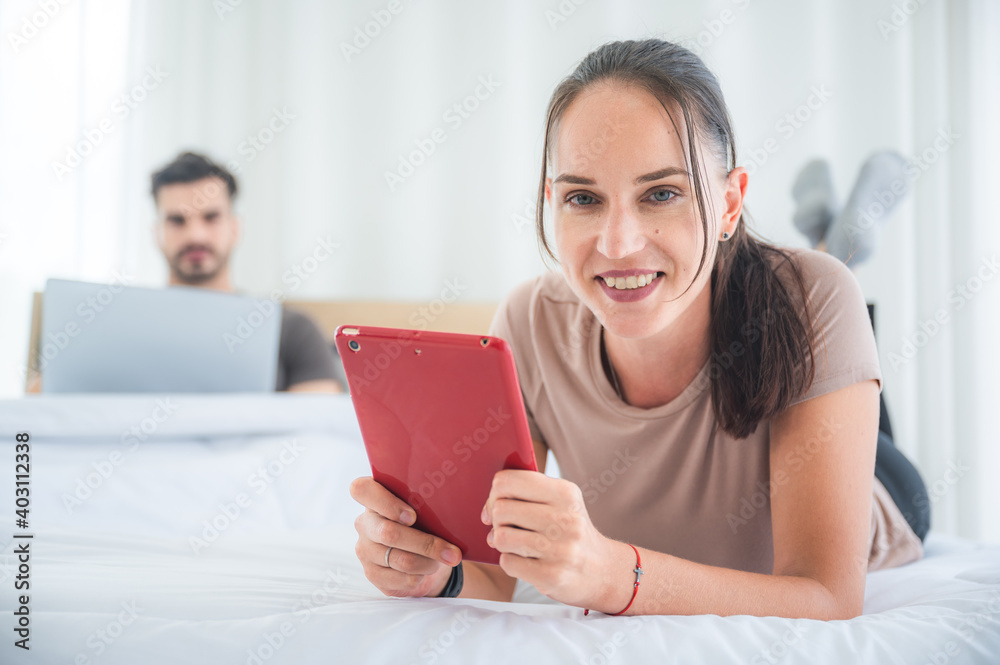 man and woman couple person family are work at home together, online business and new normal lifestyle at home
