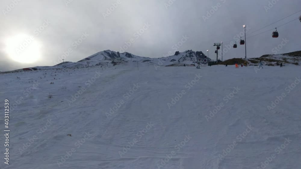 Ski sport on Erciyes mountain in Kayseri. Winter sport and relaxation. Mountain landscape with clouds. Ski sport on Erciyes mountain in Kayseri. Winter sport and relaxation. Mountain landscape with clouds.