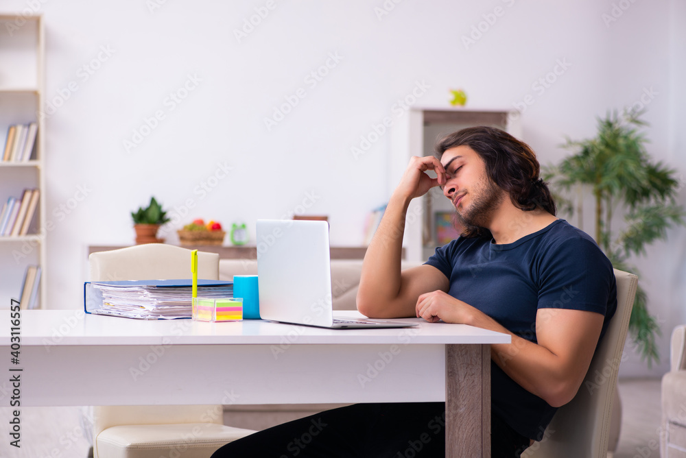 Young man employee working from house Young man employee working from house