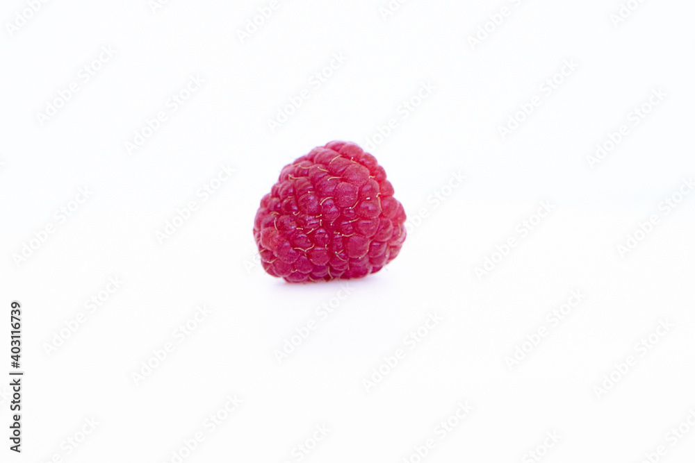 Raspberry isolated on white background. Vegan food, detox concept Raspberry isolated on white background. Vegan food, detox concept