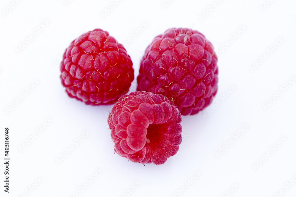 Raspberry isolated on white background. Vegan food, detox concept Raspberry isolated on white background. Vegan food, detox concept