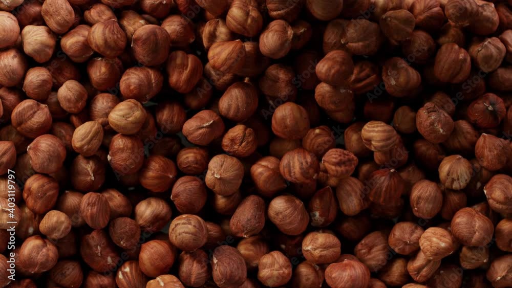 Super Slow Motion Shot of Flying and Rotating Hazelnuts at 1000 fps. Super Slow Motion Shot of Flying and Rotating Hazelnuts at 1000 fps.