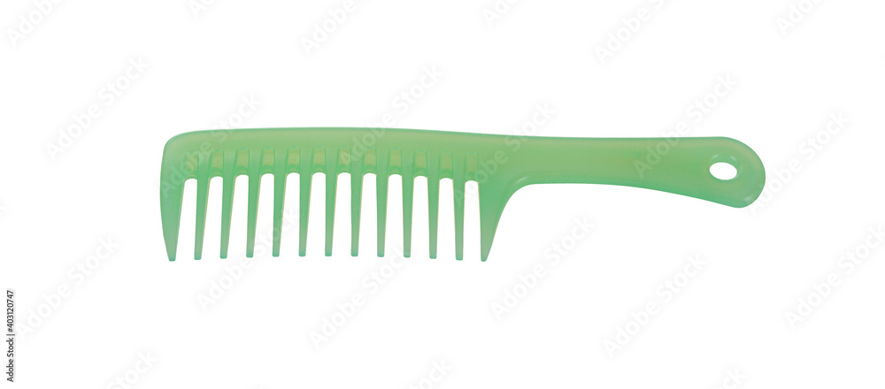 Green plastic hair comb isolated on white background Green plastic hair comb isolated on white background
