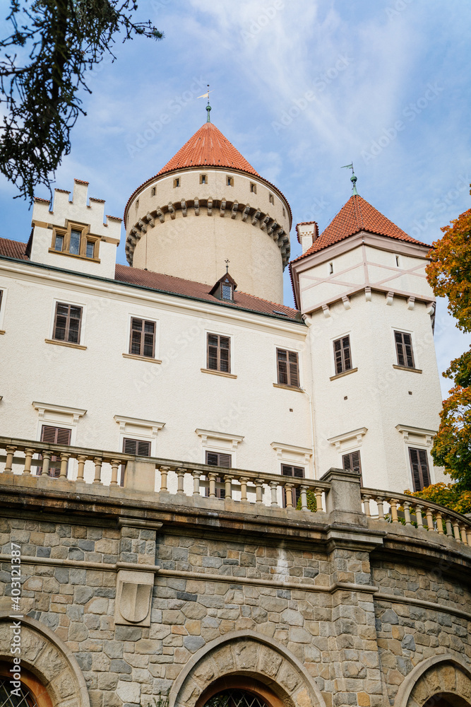Historic Medieval Konopiste castle residence of Habsburg imperial family, white tower, terrace of romantic gothic baroque Chateau in autumn sunny day, Central Bohemia, Czech Republic