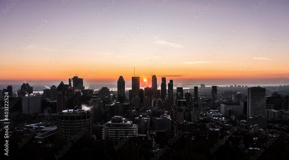 Fototapeta premium A sunrise view of downtown Montreal from Mount Royal.