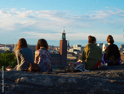 A group enjoying the view of a city.  © Dan's Photos