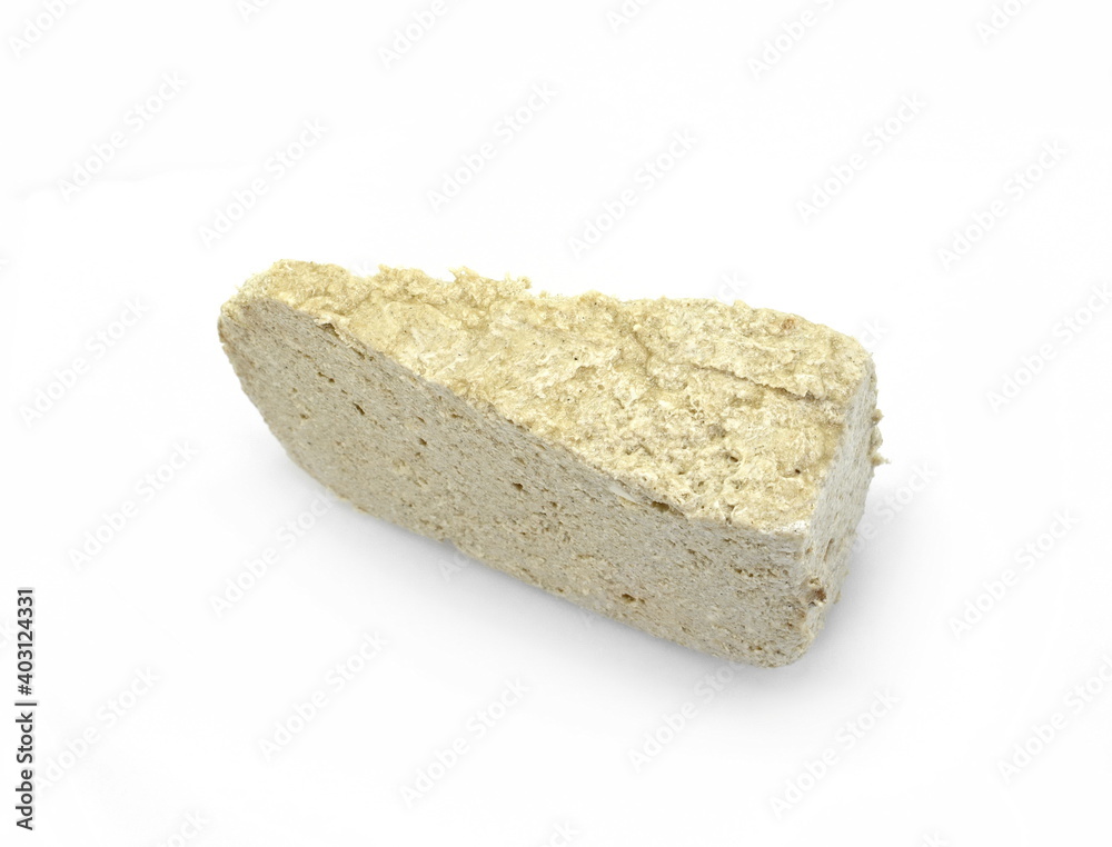 Sunflower halva isolated on white background.